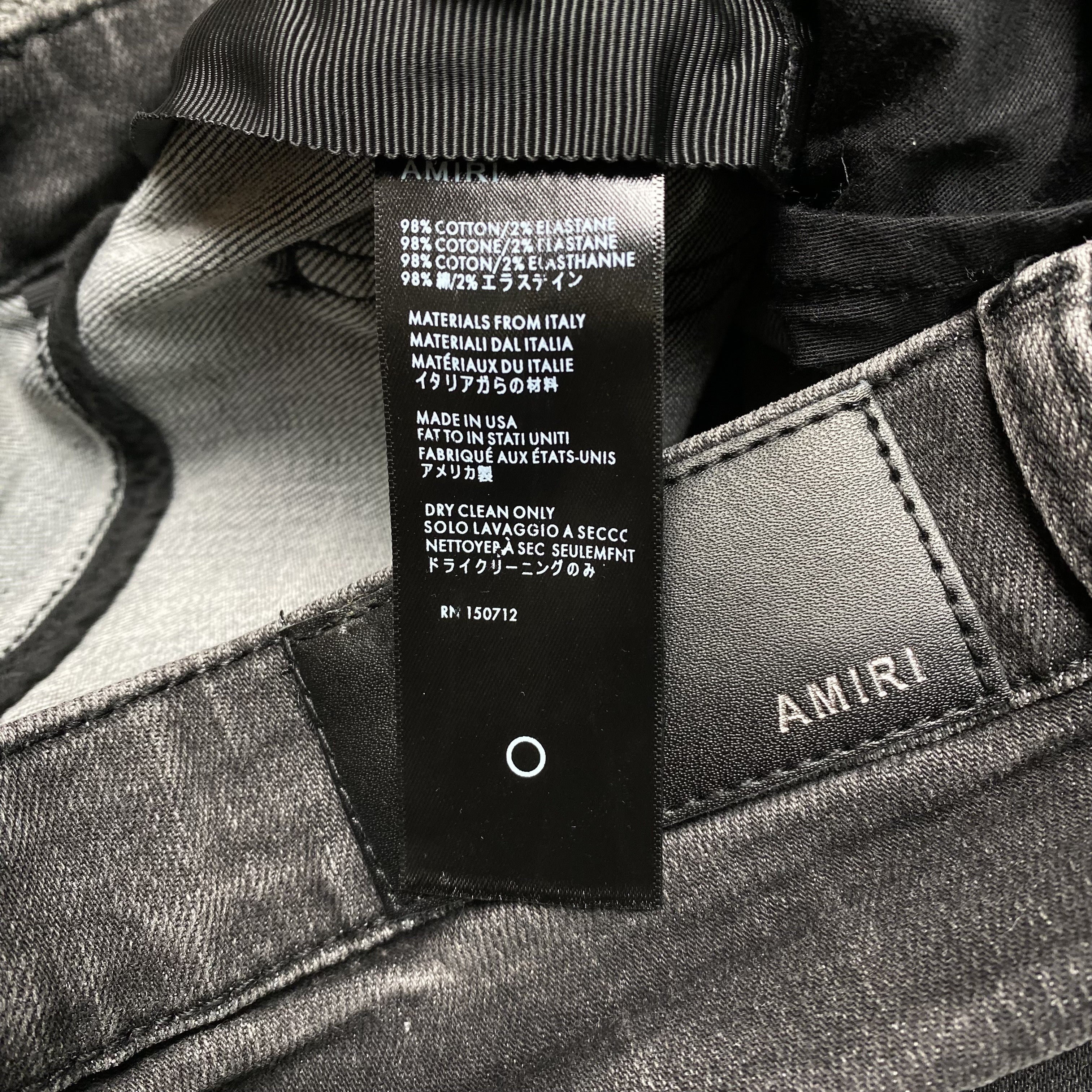 AMIRI SLASH SLIM JEANS