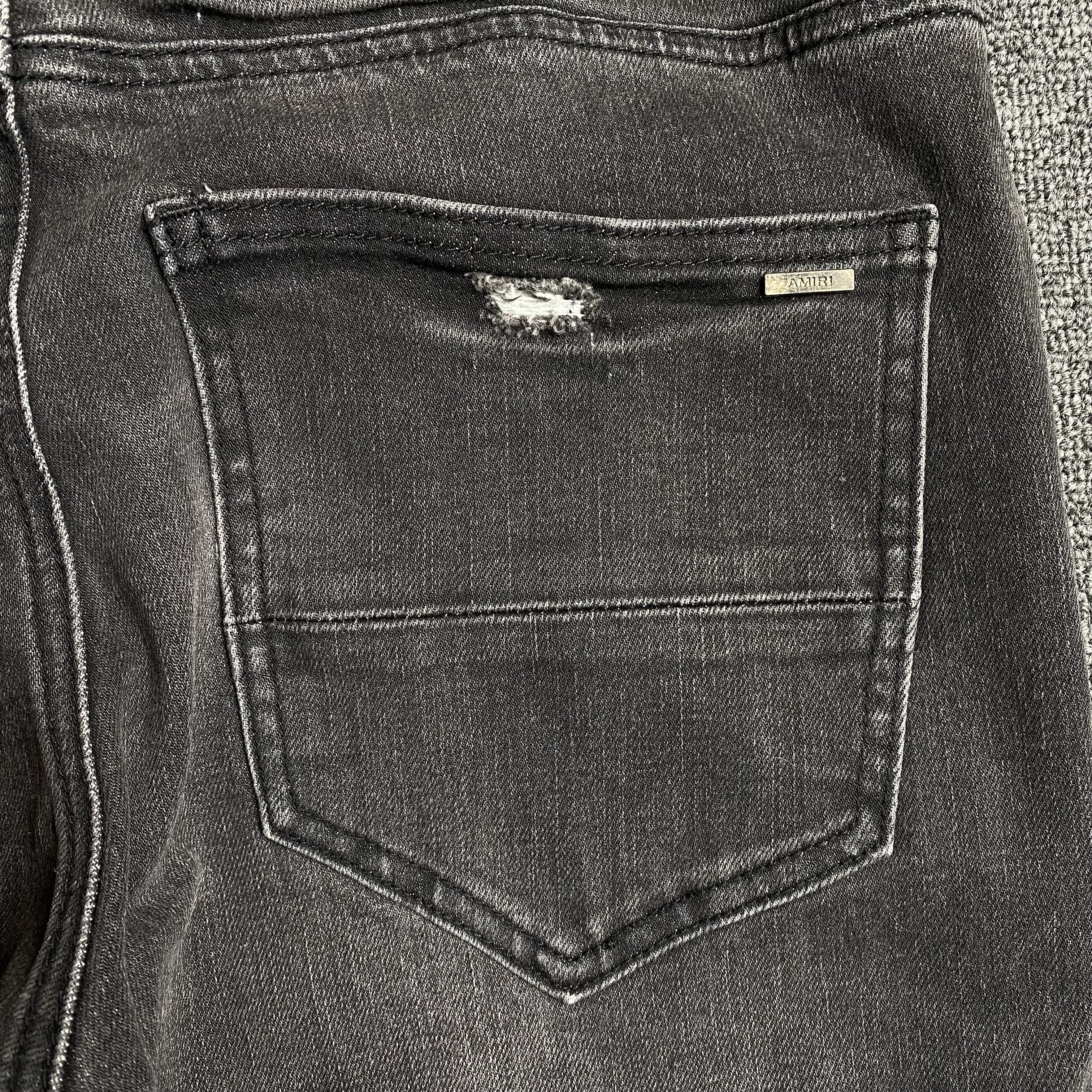 AMIRI SLASH SLIM JEANS