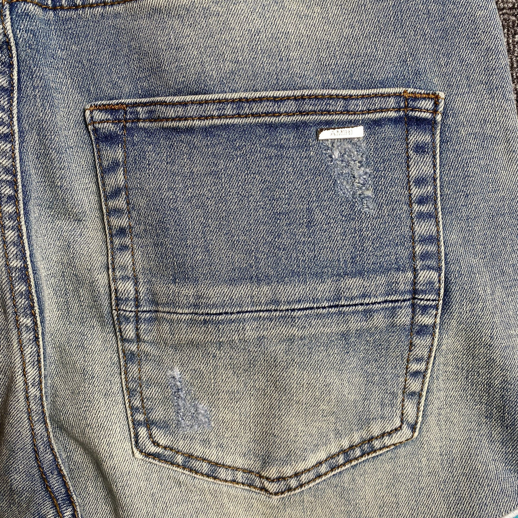 AMIRI VARSITY LOGO JEANS