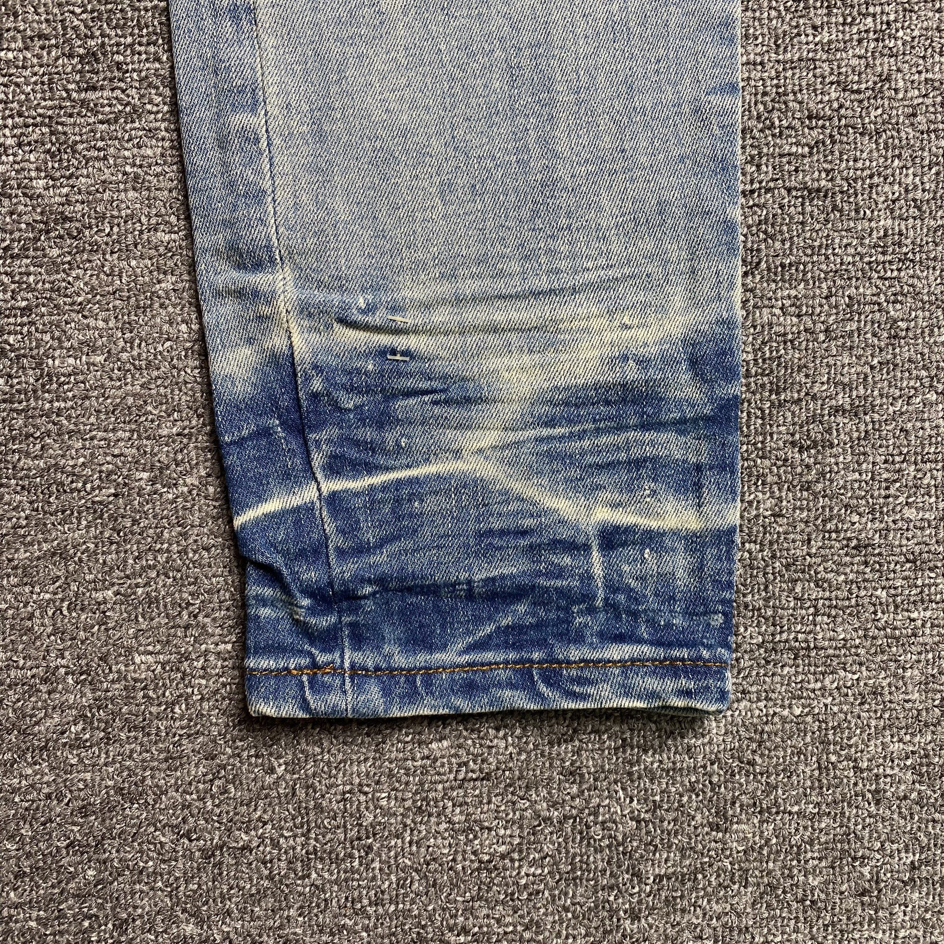AMIRI VARSITY LOGO JEANS