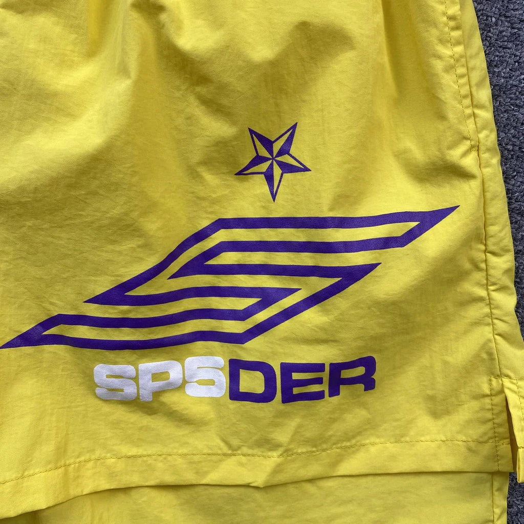 SP5DER DOUBLE LAYER SHORTS YELLOW